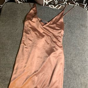 Rose gold dress with opening at the back